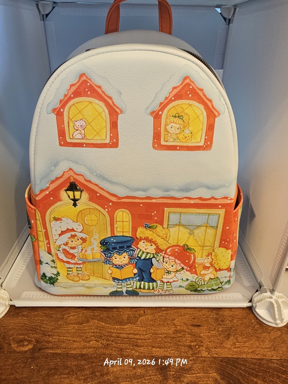 Loungefly White and Orange Strawberry Shortcake Winter Scene Mini Backpack